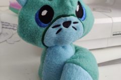 Aqua coloured fox plush