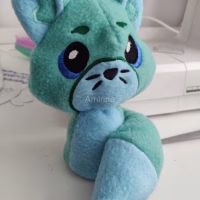 Aqua coloured fox plush